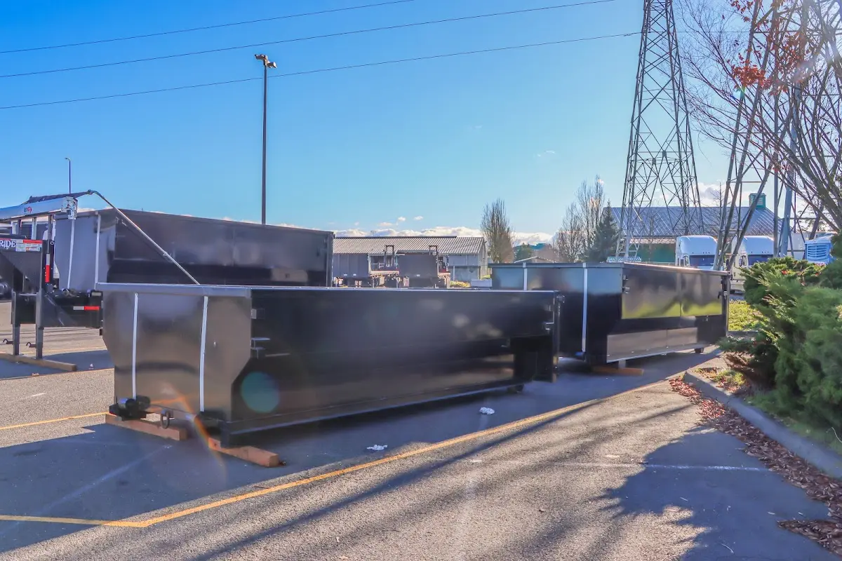 Roll-off dumpster ready for waste disposal at job site for 12 Yard Dumpster Rental in Miami Lakes
